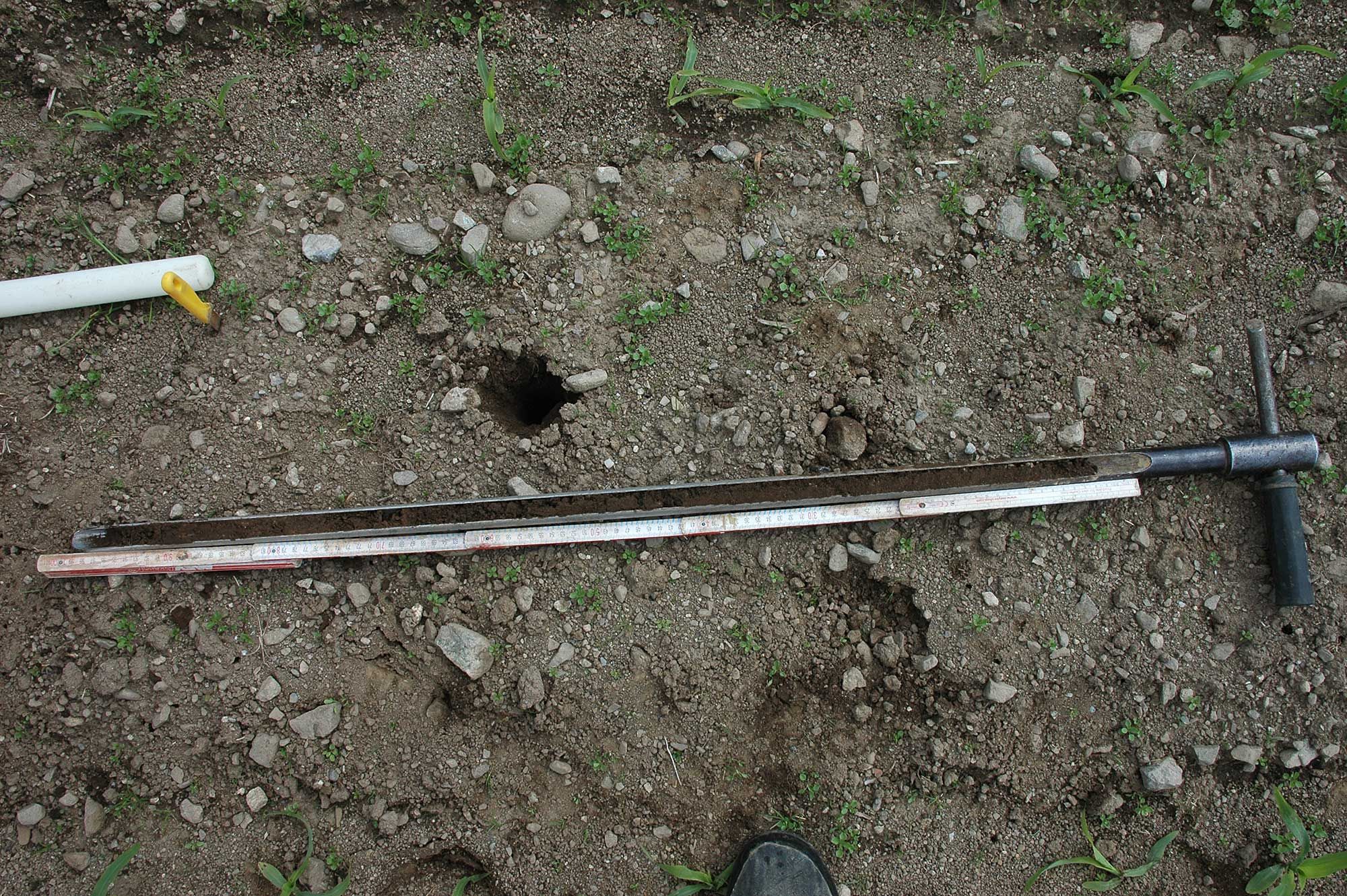 Bohrstock und Meterstab